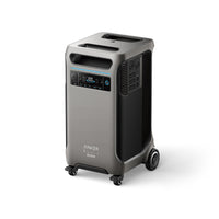 A gray Anker portable power station with wheels, handles, a digital display, and multiple ports for backup power and solar input, shown against a white background.