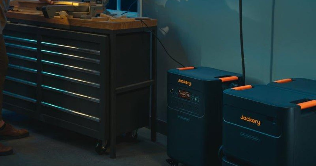 Portable power station with expansion battery packs set up for home backup in a garage