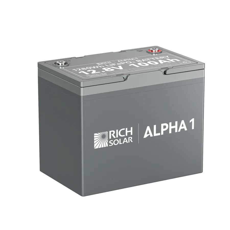 A rectangular gray Rich Solar battery labeled ALPHA 1, featuring 12.8V 100Ah specs on top and side, ideal for a 400W solar kit or MPPT charge controller, is displayed against a plain white background.