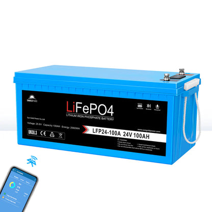A blue rectangular Sungold Power LiFePO4 24V 100Ah battery with Bluetooth, handle, and top terminal posts. Specs and icons are printed on the front. A smartphone shows a Bluetooth symbol for easy monitoring.