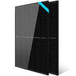 Two upright, overlapping Sungold Power monocrystalline panels feature black, rectangular designs with efficient PERC cells in a grid pattern. One panel has a shiny surface and a blue diagonal stripe in the top right corner.