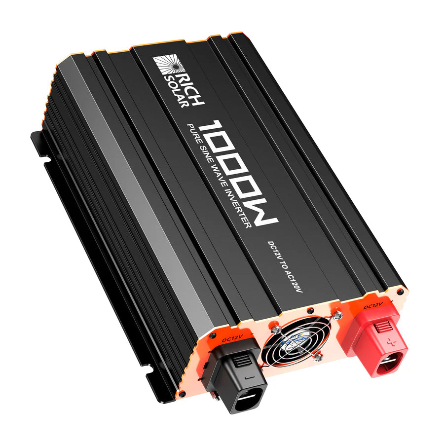 A black and orange 1000W Rich Solar inverter, with DC 12V to AC 120V terminals, cooling fan, and a 12V outlet—perfect for off-grid use—is shown at an angle.