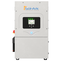 Front view of the Sol-Ark 12K Hybrid Inverter displays green indicator lights and labeled buttons. The sleek silver device with EMP protection features the Sol-Ark logo at the top.