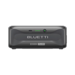 Front view of the Bluetti B300K portable power station by Bluetti, showcasing a digital display and indicator lights on its sleek dark gray casing—a modular, versatile solution for various energy needs.