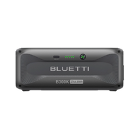 Front view of the Bluetti B300K portable power station by Bluetti, showcasing a digital display and indicator lights on its sleek dark gray casing—a modular, versatile solution for various energy needs.