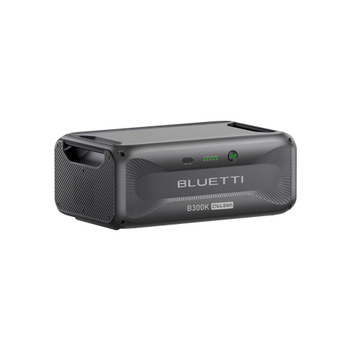 The Bluetti B300K is a portable energy solution featuring a black and gray modular design, handle, indicator lights, and 2764.8Wh capacity labeled on the front.