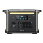 The Anker SOLIX F1500 is a black portable power station by Anker featuring a digital display, USB ports, four AC outlets, multiple buttons, and an ultra-fast recharging yellow LED light strip above the controls.