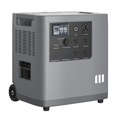The Mango Power gray portable generator features multiple outlets, a control panel, digital display, carrying handle, LFP battery cells, and wheels for easy transport—perfect for portable power and off-grid living.
