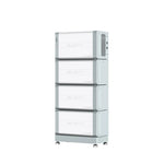 A tall, rectangular stack of four gray Bluetti EP500 Expansion battery modules with control ports on the right and adjustable feet stands against a white background—ideal for solar energy storage and energy independence.