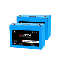 Two blue rectangular Sungold Power 12V 100Ah LiFePO4 deep cycle batteries are shown, each with black panels labeled in white and red text and metal terminals on top for reliable connections.