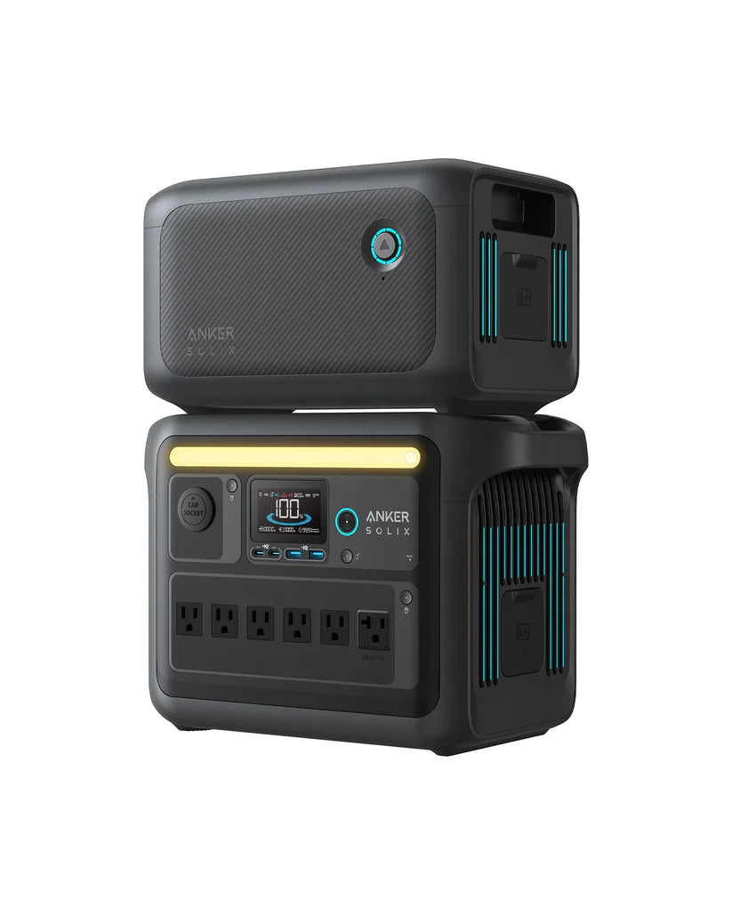 The Anker SOLIX C1000X is a black portable power station with a display screen, multiple outlets, blue and yellow accent lights, and a stacked battery module—ideal as a mobile solar generator for dependable energy anywhere.