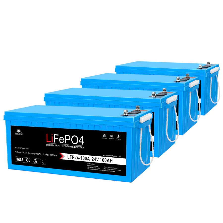 Four blue rectangular 24V 100Ah LiFePO4 batteries from Sungold Power are arranged diagonally, each featuring a white handle and label. These batteries include an advanced Battery Management System (BMS) for enhanced safety and performance.