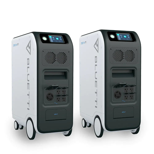 Two Bluetti portable power stations with pure sine wave inverters, wheels, front displays, and multiple outlets in a sleek white and black design are placed side by side against a white background.
