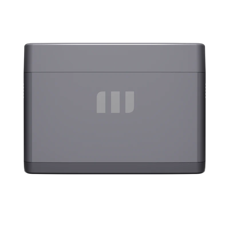 A compact, rectangular gray Mango Power device with a minimalist design and a subtle front logo of three vertical bars, this unit delivers portable power using reliable LFP battery cells for versatile use.