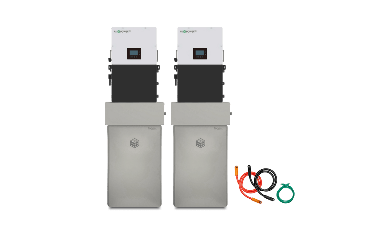 Two tall, metallic BigBattery storage units with white control panels on top stand side by side for high-capacity power storage. Three coiled cables—red, black, and green—are placed to the right of the units.