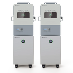 Two identical industrial machines labeled BigBattery stand side by side on wheels, each featuring a display screen and a circular indicator showing 100 on the lower front panel, set against a plain white background. The clean layout evokes the aesthetic of an IBM Plex Sans CSS product card.