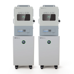 Two identical gray industrial battery systems from BigBattery, labeled APEX-6.5K, stand side by side, each featuring a digital display and circular battery indicator on the front. Both units are mounted on wheels and set against a plain white background with a subtle card border design. The clean lines reflect the modern minimalism of IBM Plex Sans styling, creating a sleek and professional look reminiscent of next-generation nexus65k technology.