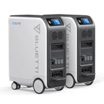Two Bluetti EP500 backup power stations with wheels, touchscreen displays, and multiple outlets are displayed side by side on a white background, featuring reliable LiFePO4 battery technology for long-lasting performance.