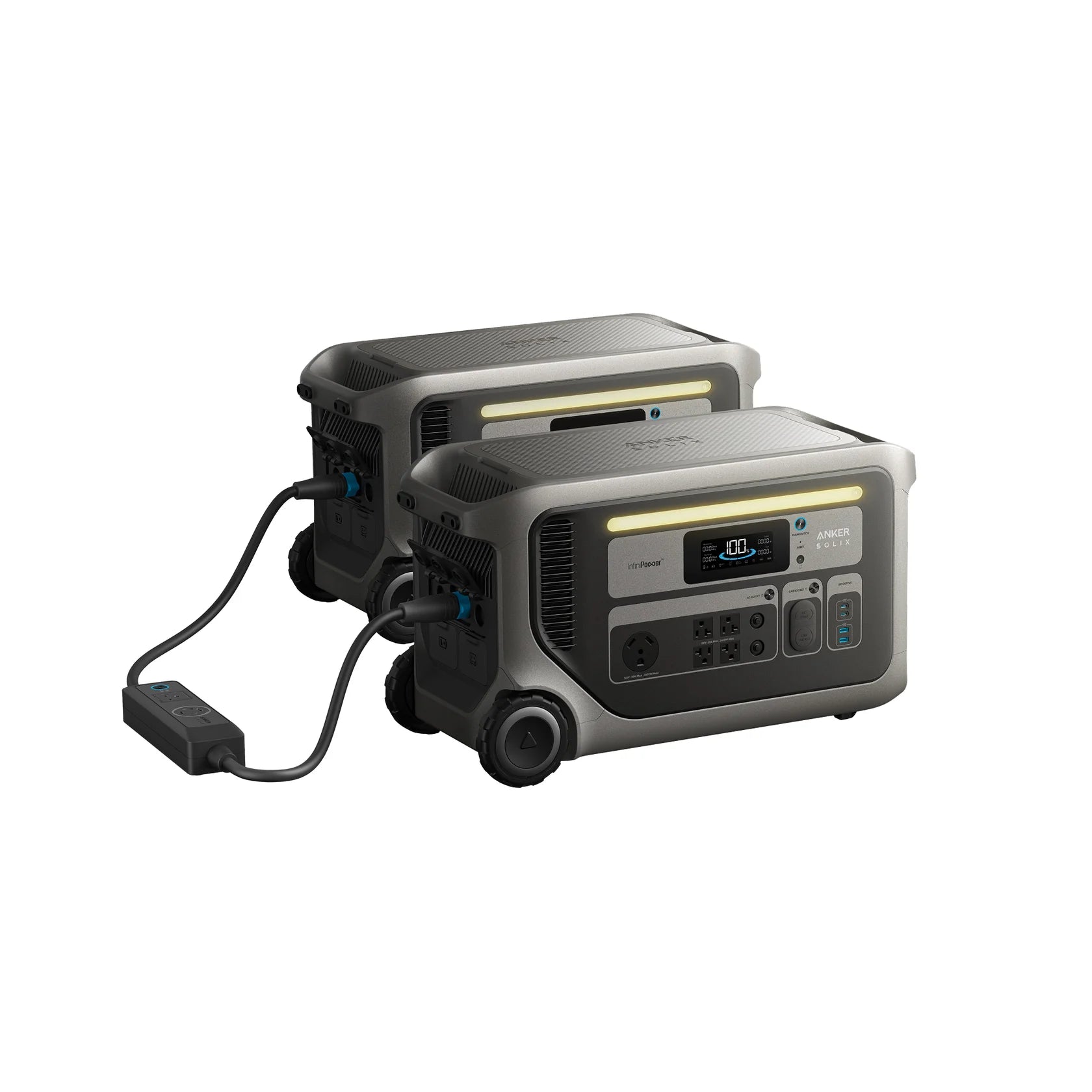 Two Anker portable power stations with digital displays are linked by a cable, perfect for emergency backup. The gray units have black accents, wheels, and multiple front power outlets and ports.