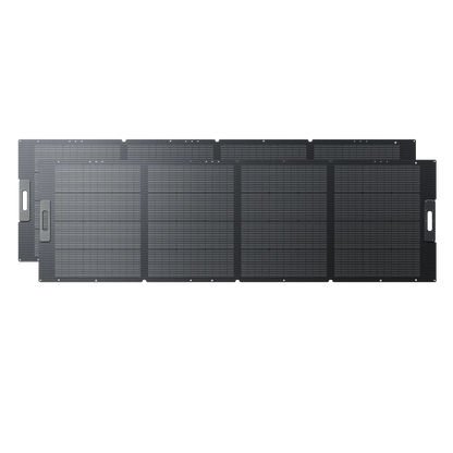 Four black rectangular Bluetti PV350 solar panels, each with a grid pattern and side handle, are arranged in a partially overlapping row—making this Bluetti portable power solution perfect for outdoor or travel use.