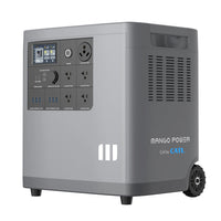 A portable gray power station by Mango Power with advanced LFP battery cells, multiple outlets, USB ports, a display screen, and wheels for easy mobility—ideal for off-grid adventures.