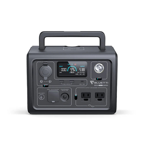 A black Bluetti Portable Power Station features a digital display, Pure Sine Wave Inverter, multiple control buttons, USB ports, AC outlets, DC ports, and a sturdy top handle for easy carrying.