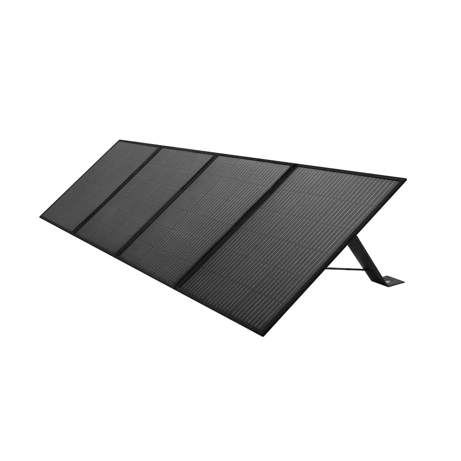 A Zendure portable black solar panel with four rectangular sections is propped up on a supporting stand against a white background, perfect for smart energy management and home integration.