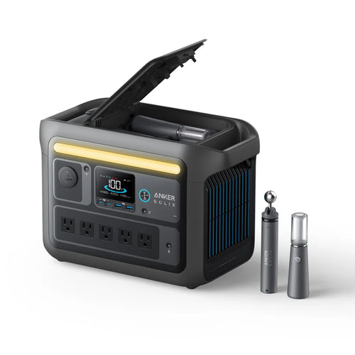 An Anker portable power station with a digital display, four AC outlets, and storage space under an open lid. Powered by LiFePO4 batteries, its perfect for devices or camping lights. Two metallic cylinders are placed beside it on a white background.