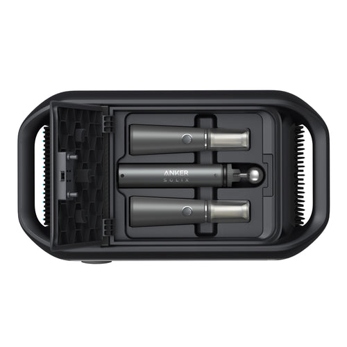 Top-down view of a black Anker case for the Solix power station, holding two cylindrical tools with metallic ends and an accessory, all neatly fitted in custom slots.