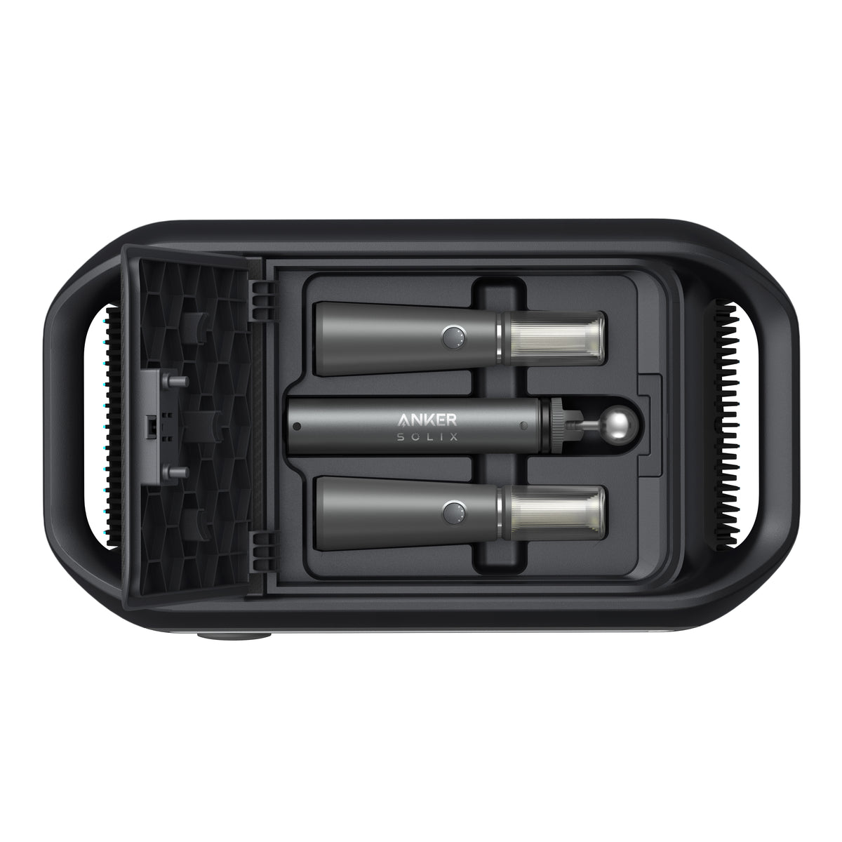 Top-down view of a black Anker case for the Solix power station, holding two cylindrical tools with metallic ends and an accessory, all neatly fitted in custom slots.