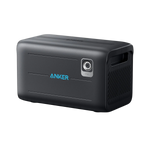 Anker’s black portable power station features a blue Anker logo on the front, a side handle, front power outlet, and solar input, providing convenient home backup power.