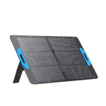 An Anker portable 625 solar panel with two blue handles stands upright on its support leg, displaying high conversion efficiency against a white background.