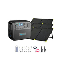 A Bluetti AC200Max portable power station with digital display stands beside a foldable solar panel, displaying Bluettis innovative solar energy solution with organized cables, adapters, and accessories below.