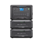 A Bluetti AC300 power station with UPS Protection sits atop two Bluetti B300 LiFePO₄ Battery modules. The black units display front control panels, ports, and prominent Bluetti branding.