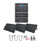 A Bluetti AC300 portable power station with two stacked modular battery units, four foldable solar panels for charging, plus connecting cables and accessories organized beneath.