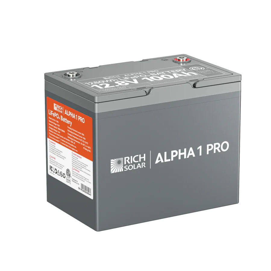A gray Rich Solar ALPHA 1 PRO LiFePO4 Battery features orange and white labeling, visible technical specs, and top terminal posts. This 12.8V 100Ah battery delivers dependable power for many applications.