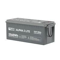 A gray rectangular Rich Solar ALPHA 2 LITE LiFePO4 Battery, 12.8V 200Ah (2560Wh), with side handles, product labels, and specs printed on its surface.