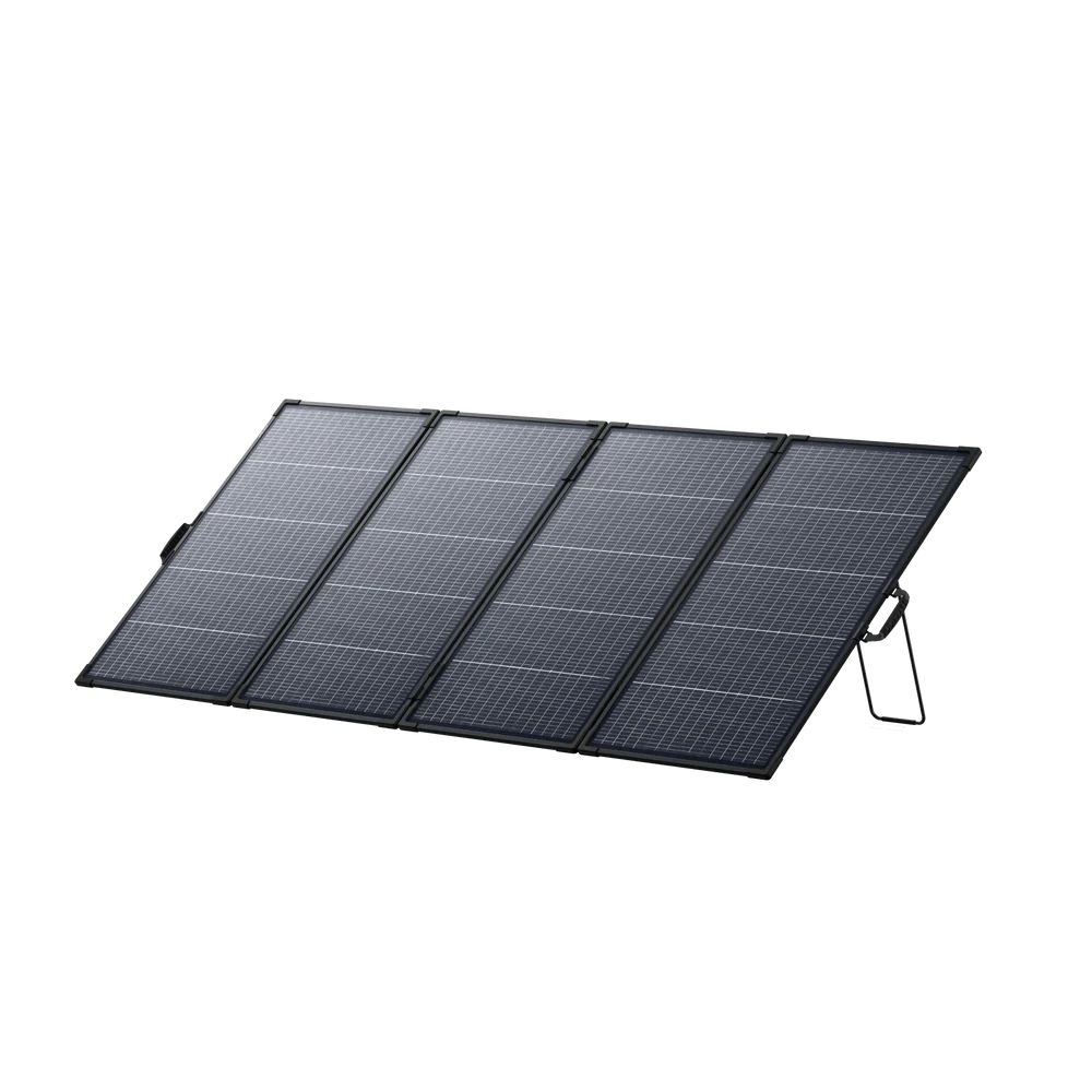 A portable, foldable monocrystalline solar panel with four connected sections is propped up on angled metal stands against a plain white background. This 400W portable solar panel, the Anker SOLIX PS400, delivers efficient energy wherever you need it.