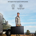 A man stands outdoors beside a van, holding a large, folded portable solar panel. Text above highlights the 400W monocrystalline solar panel is under 22 lb, 50% lighter than typical panels of its class, with dimensions and weight listed.