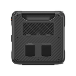 A black, rugged, rectangular device with a textured surface, a handle at the top, two battery slots at the bottom, and a mesh window in the center—this is the Bluetti portable power station, engineered for durability and reliable performance wherever you go.