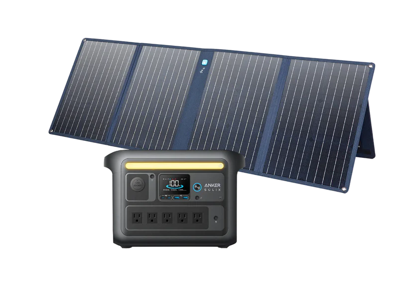 An Anker portable solar panel and a black Anker power station with LiFePO₄ batteries, multiple outlets, and a digital display are displayed together on a white background.