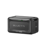 A black rectangular BLUETTI B500K portable power station with a handle, side vents, and indicator lights is shown on a plain white background, making it clear that this solar generator is both sleek and functional for various energy needs.