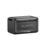 A black Bluetti B500K portable power station, also known as a solar generator, with a digital display and handle is shown on a plain white background.