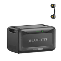 A black BLUETTI B500K portable power station with a small connector cable shown above it. The power station displays a battery level indicator and 5120Wh capacity label on its front panel, making it an ideal bluetti battery solution for dependable backup power.