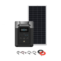 An EcoFlow Delta Max portable power station by Ecoflow, featuring a display screen, is shown with a large solar panel behind it and various charging cables arranged below on a white background.