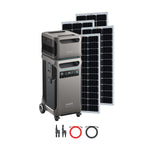 The Anker SOLIX F3800 portable power station with wheels, digital display, and various ports is displayed next to three solar panels and two connection cables (one black, one red) on a white background—ideal for solar power systems.