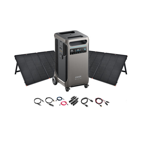 Anker portable power station with digital display, two foldable solar panels behind it, plus multiple charging cables and connectors in front—an ideal off-grid energy solution, all displayed on a white background.