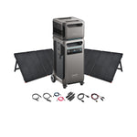 Two Anker portable power stations, including the SOLIX F3800, are stacked together with four foldable solar panels behind and charging cables in front, showcasing a versatile Anker Solar Power System on a white background.