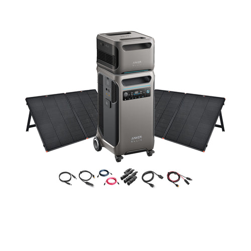 Two Anker portable power stations, including the SOLIX F3800, are stacked together with four foldable solar panels behind and charging cables in front, showcasing a versatile Anker Solar Power System on a white background.