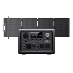 A Bluetti portable power station with a LiFePO4 battery, multiple ports, and an LCD screen is displayed in front of four connected Bluetti solar panels.